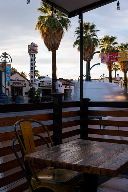 Long Exposure Street Photography Image of Palm Trees and Theatre on Palm Canyon in Palm Springs, California