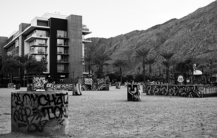 Street Photography Image of Kimpton Hotel, Mountain views and concrete structrues with grafiti in Palm Springs, California